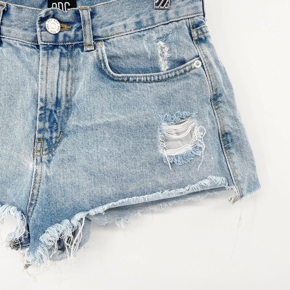 UO BDG Distressed Cheeky Cut Off Shorts Light Wash Sz 28 Raw Hem Denim Mid Rise - Picture 5 of 8